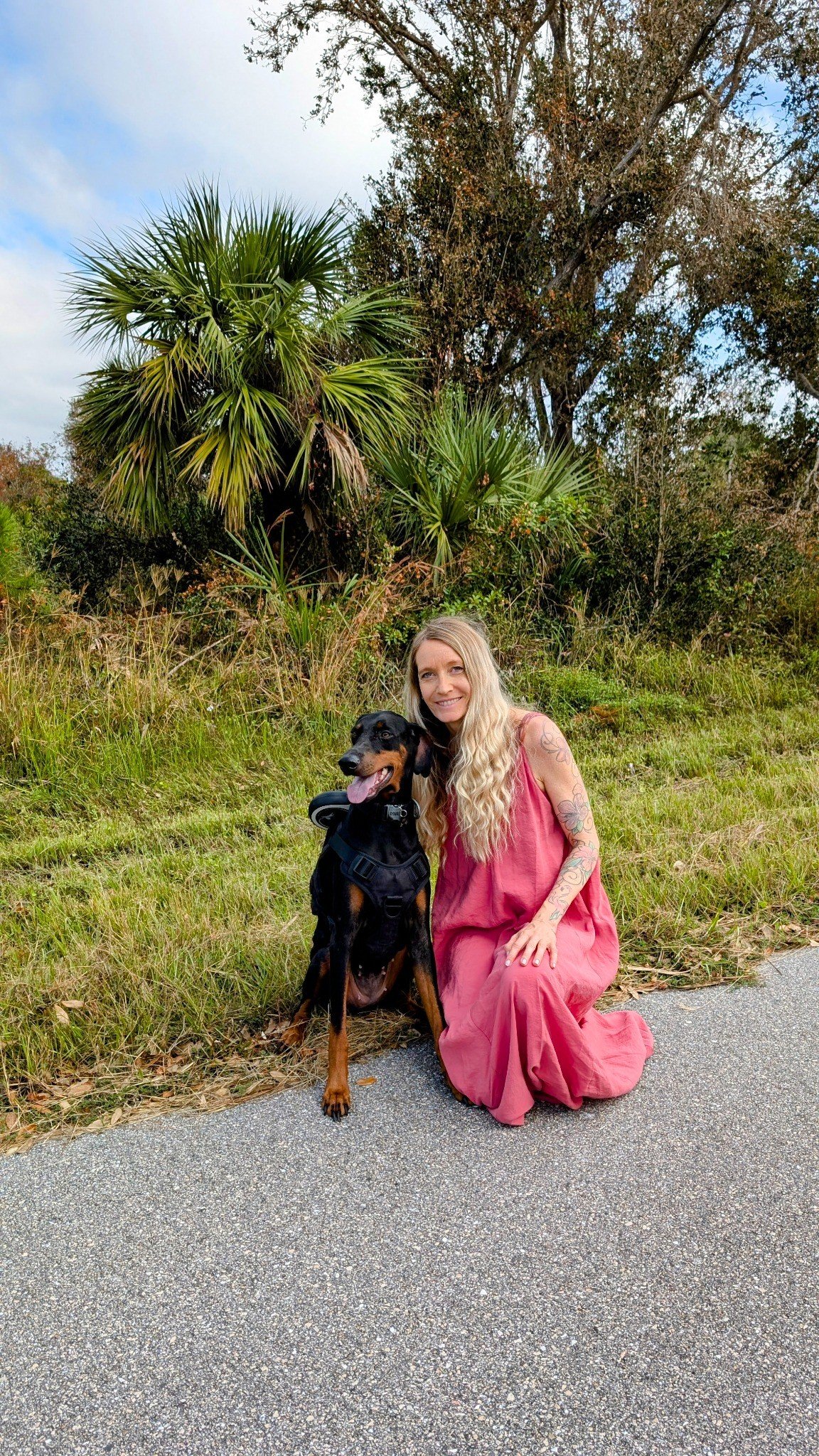 Peggy Jobst with a dog outdoors in Florida